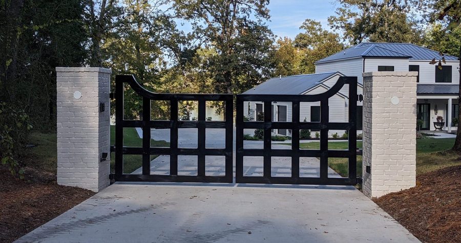 Custom ornamental iron entrance gate built by One-Ten Welding