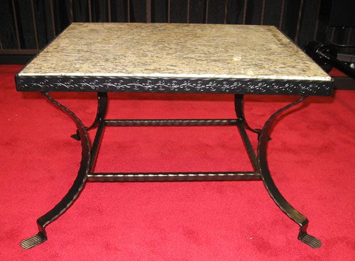 Square table sports a marble top with inlaid metal frame and legs.