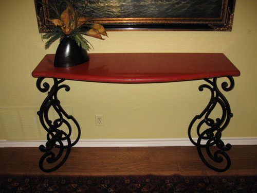 Large curves on the intricate legs blend with the smooth marble top to form this accent table perfect for entry or living rooms